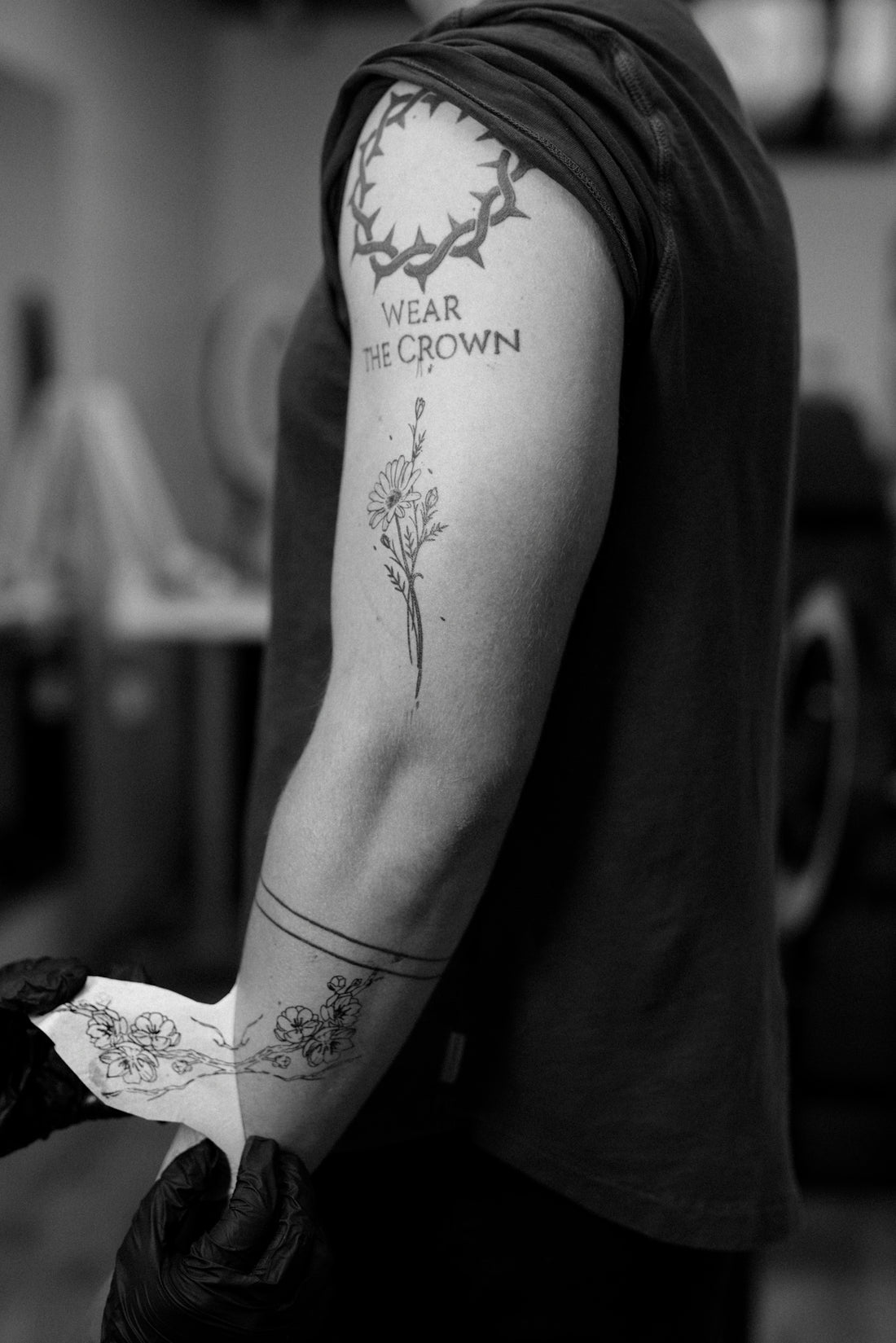 a person with tattoos on their arm